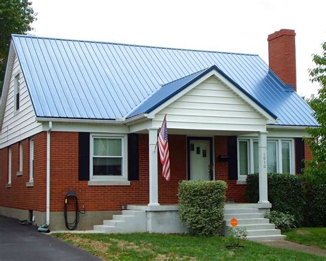 red metal roof blue house|homes with red metal roofs.